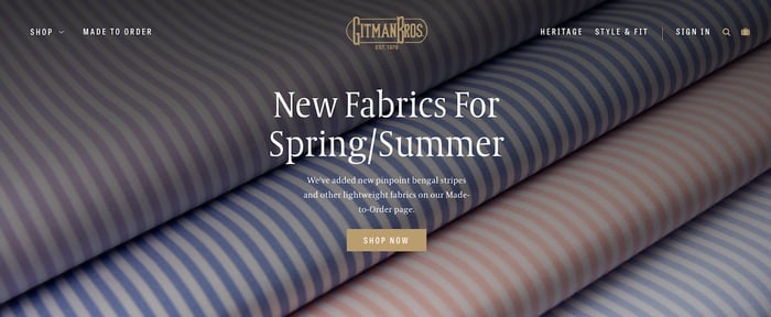 Gitman Bros small business website examples with fabric in the background
