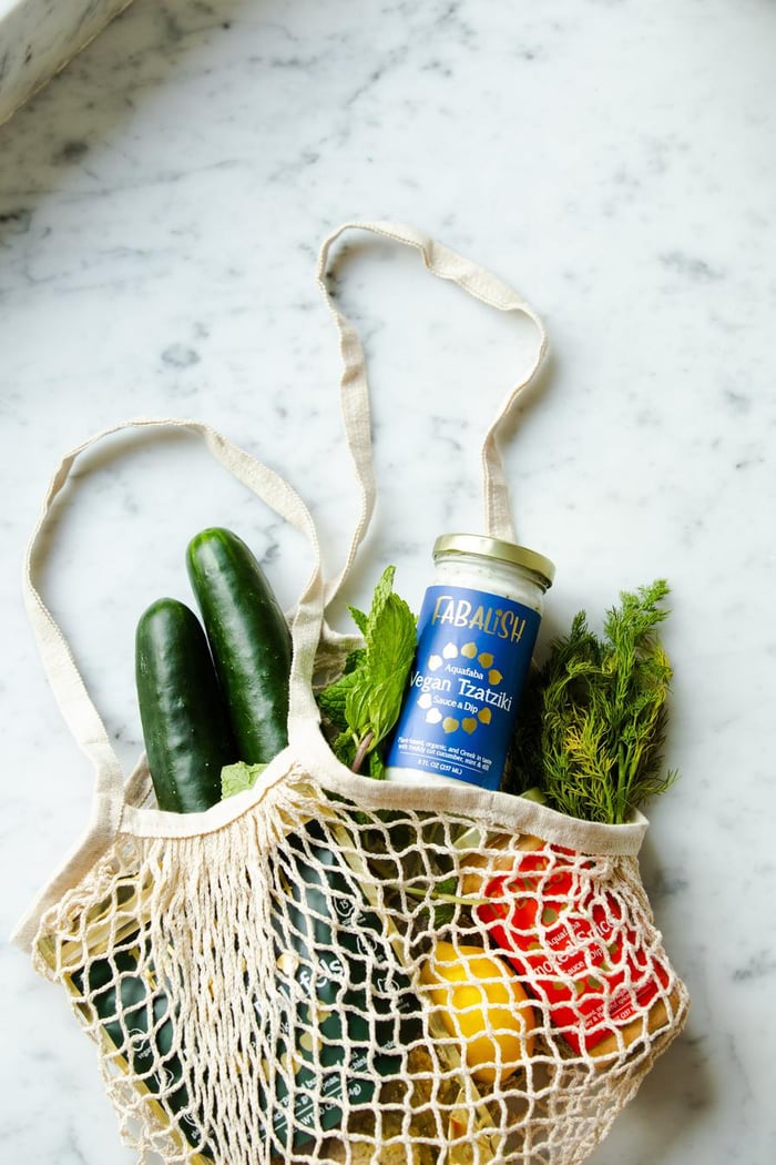 Knitted shopping bag with groceries 