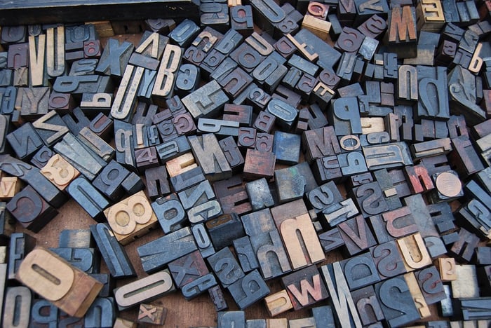 pile of typography blocks in varying sizes and colors