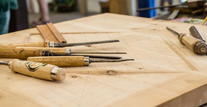 Woodcarving equipment on a work bench