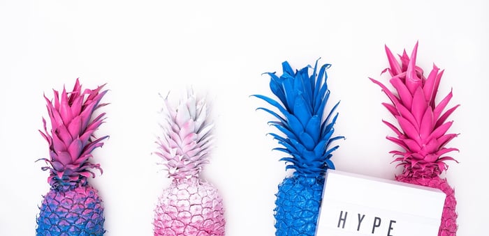 Colorful pineapples against a white background