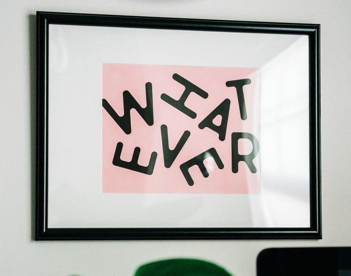 Whatever Print on Pink Background Framed on Wall