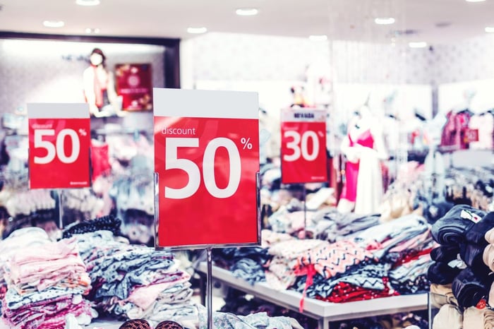 Discount labels on clothing racks
