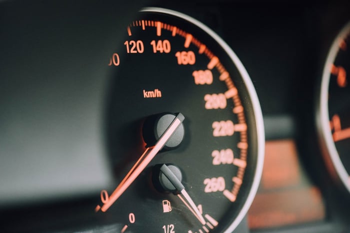 A closeup of a car's speed gauge 