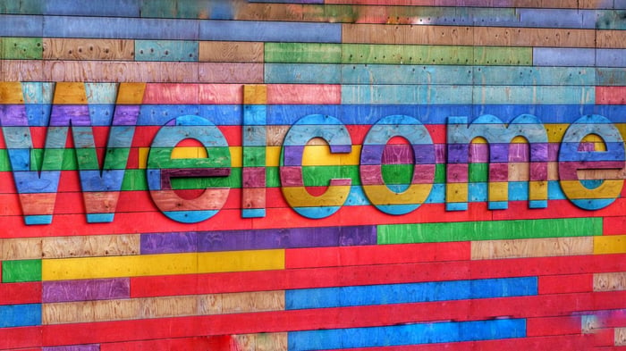multicolored 3D wall sign that says welcome
