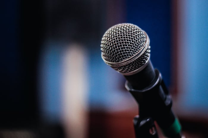 Microphone against a blurry blue background